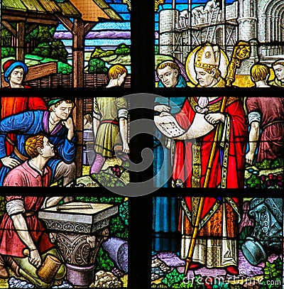 Saint Rumbold - Stained Glass in Mechelen Cathedral Stock Photo