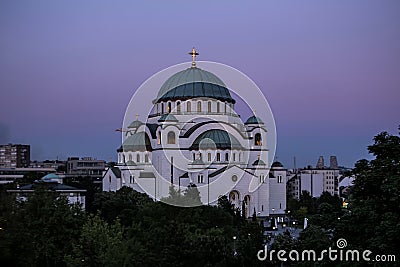 Saint Sava temple and beautiful purple sky at twilight , Belgrade Editorial Stock Photo