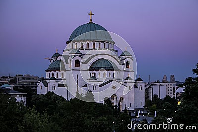 Saint Sava temple and beautiful purple sky at twilight , Belgrade Editorial Stock Photo