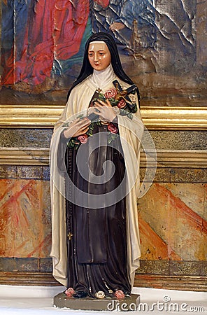 Saint Teresa, a statue on the altar of the Magi in the Church of the Visitation of the Virgin Mary in Vinagora, Croatia Editorial Stock Photo