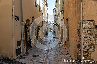 Saint Trope narrow street with plants Stock Photo