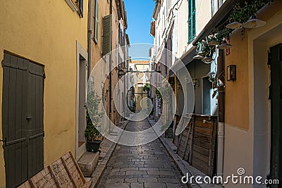 Saint Trope narrow street with plants Stock Photo