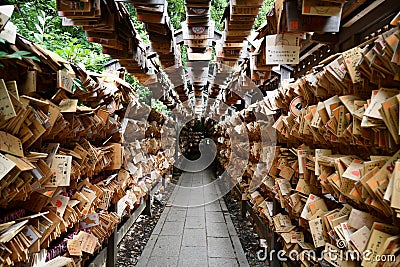 SAITAMA, JAPAN - JULY 3, 2019: The tunnel of wooden plaques or Ema at Kawagoe Hikawa Shrine. Editorial Stock Photo