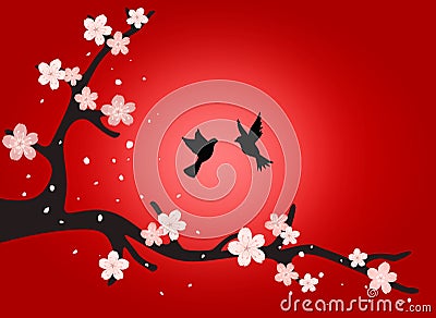 Sakura.A branch of cherry blossoms with birds at red sunset. Stock Photo