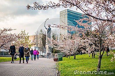 Sakura park and croud of people, Vilnius Editorial Stock Photo