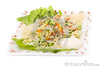 Salad with assorted greens, fried pork, carrots Stock Photo