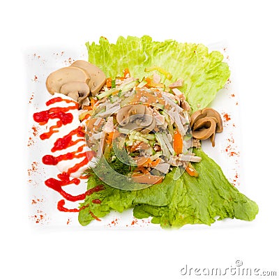 Salad with assorted greens, fried pork, carrots Stock Photo