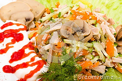 Salad with assorted greens, fried pork, carrots Stock Photo