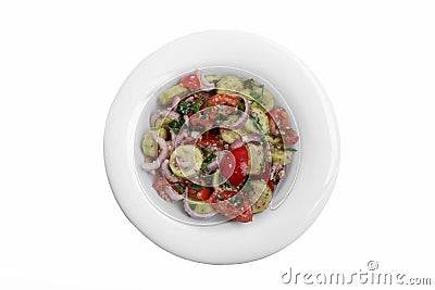 Salad cucumber tomatoes with walnuts traditional Georgian dish white background top view Stock Photo