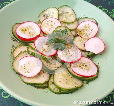 Salad of cucumbers and radish Stock Photo