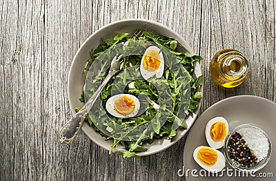 Salad dandelion with eggs Stock Photo