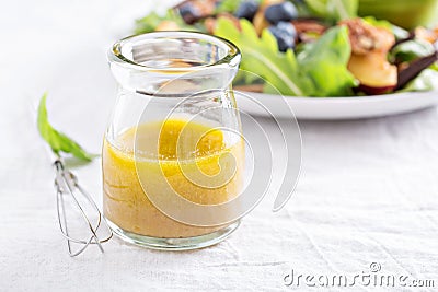 Salad dressing with olive oil and vinegar Stock Photo