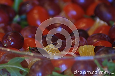 Salad in a glass dish. Rocket salad with grapes Stock Photo