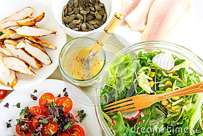 Salad with grilled meat, smoked fish and different vegetables. Stock Photo