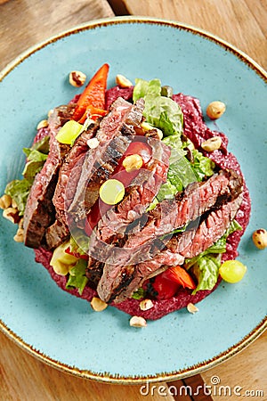 Salad with Grilled Prime Beef or Thick Slices of Marbling Steak Stock Photo