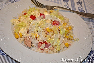 SALAD RICE FRESCH SUMMER FOOD WITH TOMATO MAJONNAISE SALAD TUNA FISH Stock Photo