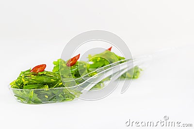 Salad seaweed in a plastic snack tray Stock Photo