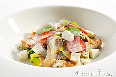 Salad with Smoked Eel Fish or Unagi, Avocado and Strawberries Stock Photo