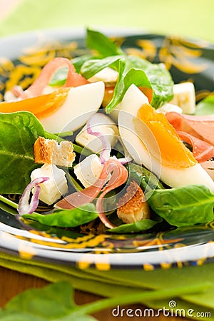 Salad with spinach,egg and ham Stock Photo