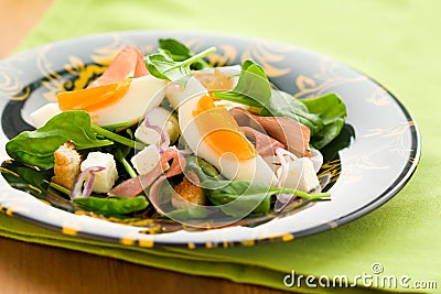 Salad with spinach,egg,ham Stock Photo