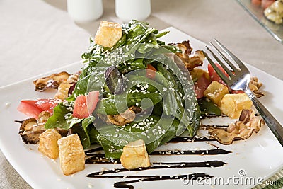 Salad with spinach, grilled ham and potato Stock Photo