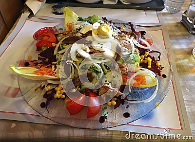 Salade Nicoise at a small alpine restaurant Stock Photo