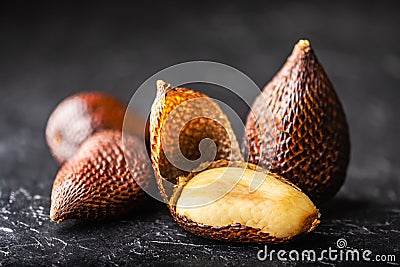 Salak fruit or snake fruit on black background Stock Photo