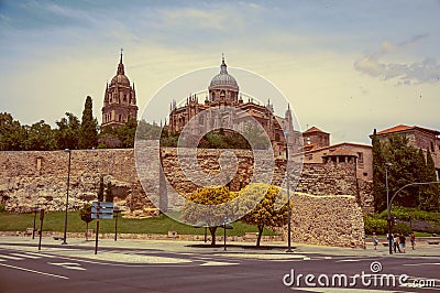 Dome and steeple from New Cathedral and street at Salamanca Editorial Stock Photo