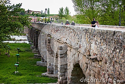 The historical Roman bridge of Salamanca also known as Puente Mayor del Tormes Editorial Stock Photo