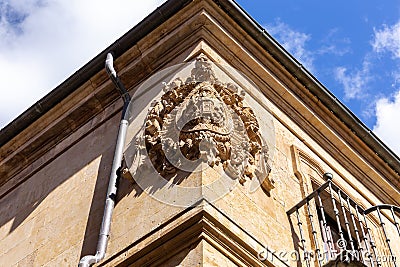 University of Salamanca (Unamuno House Museum) corner stone facade with carved Coat of Arms, Spain. Editorial Stock Photo