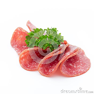 Salami smoked sausages slices isolated on white background. Stock Photo