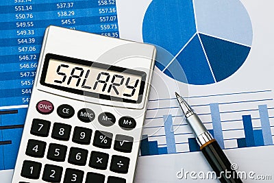 Salary displayed on calculator Stock Photo