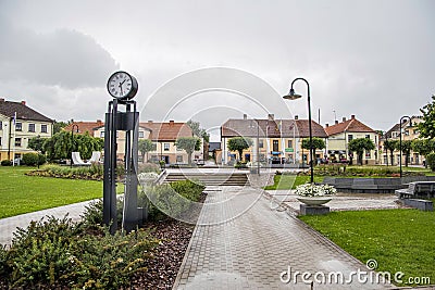 Saldus, Latvia - July 3, 2023: Kalpaka Laukums in town center of Old town Saldus on a rainy day Editorial Stock Photo