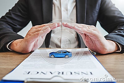 Sale agent protection Car insurance and collision damage concept Stock Photo