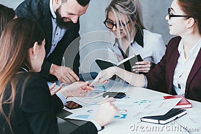 Sale analysis corporate growth rate discuss tablet Stock Photo