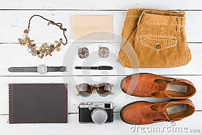 Sale concept - set of cool woman stuff on wooden floor Stock Photo