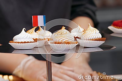 Mini tarts, cupcakes displayed at the French wine and food street festival in Prague Holesovice. Stock Photo