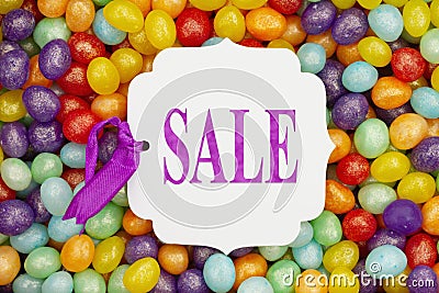 Sale message gift tag over colorful jellybean candy Stock Photo