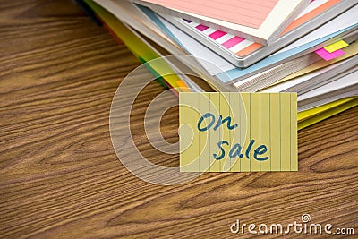 On Sale; The Pile of Business Documents on the Desk Stock Photo