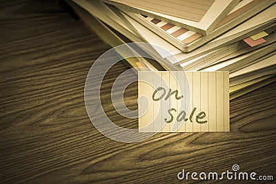 On Sale; The Pile of Business Documents on the Desk Stock Photo