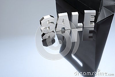 Sale silver text with black paper bag Stock Photo