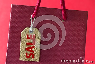 Sale tag on shopping bag Stock Photo