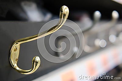 Sale of wall hooks hangers in the store, close-up Stock Photo