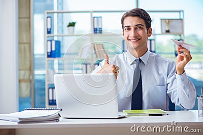 The sales agent working in travel agency Stock Photo