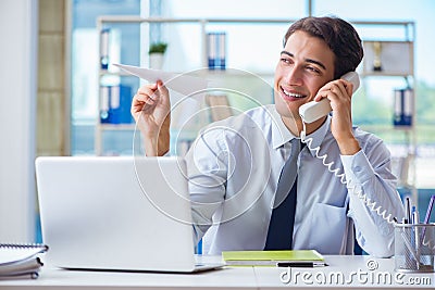 The sales agent working in travel agency Stock Photo