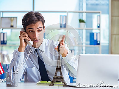 Sales agent working in travel agency Stock Photo