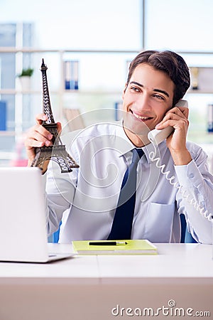 The sales agent working in travel agency Stock Photo