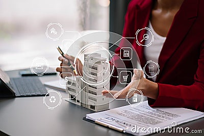 Salesman Hands On House Model , Small Toy House Small Mortgage Property insurance and concepts real estate with VR icon Stock Photo
