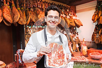 Salesperson in the store jamon Stock Photo