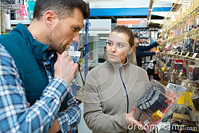 saleswoman assisting customer Stock Photo